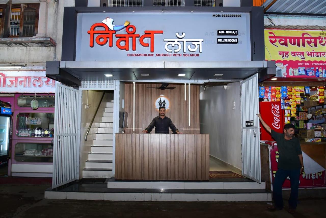 Nivant Lodge Solapur Bagian luar foto