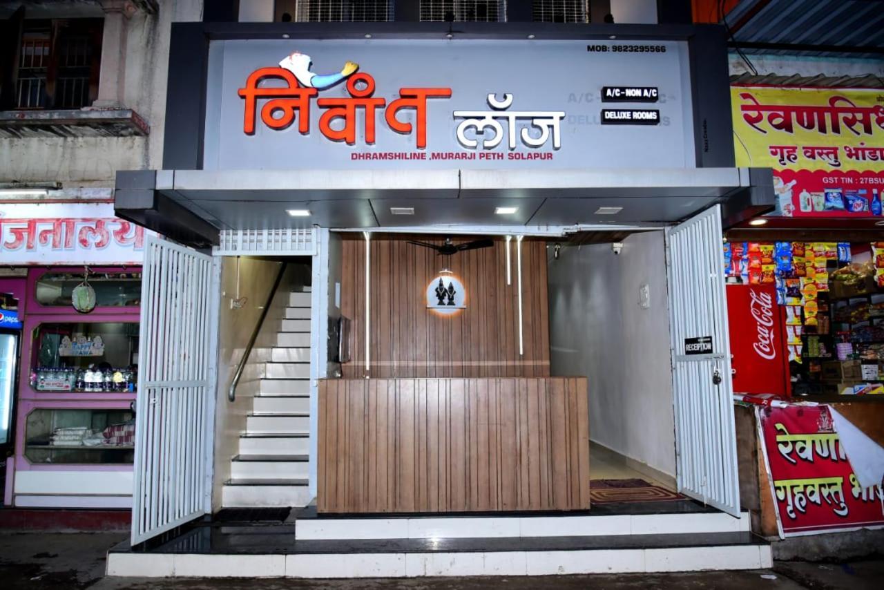 Nivant Lodge Solapur Bagian luar foto